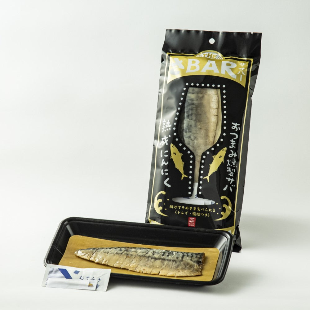 THE SABAR Smoked Mackerel package with tray, toothpick, and hand towel, featuring carefully selected fatty Norwegian mackerel.