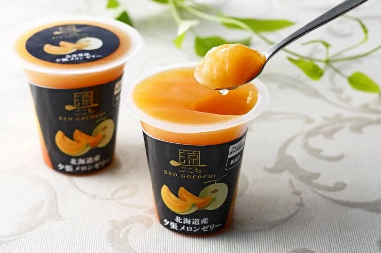 Ryo Gocochi Hokkaido Yubari Melon Jelly showing spoonful of juicy Yubari melon jelly, known for its mellow aroma and rich flavor.
