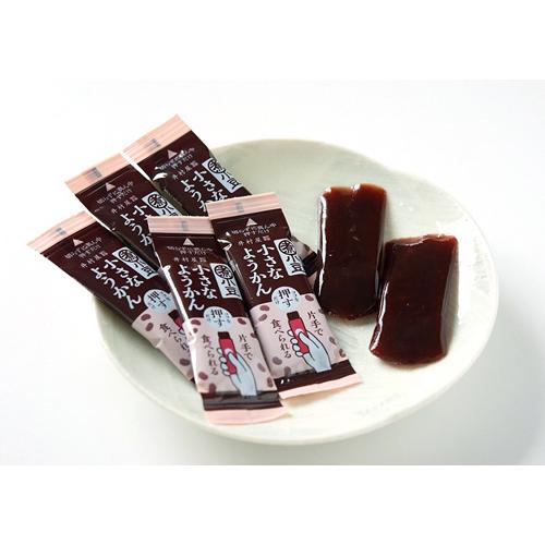 Small Yokan sweet bean paste jelly in easy push-out packs on a plate. Convenient one-hand snack, allergen-free.