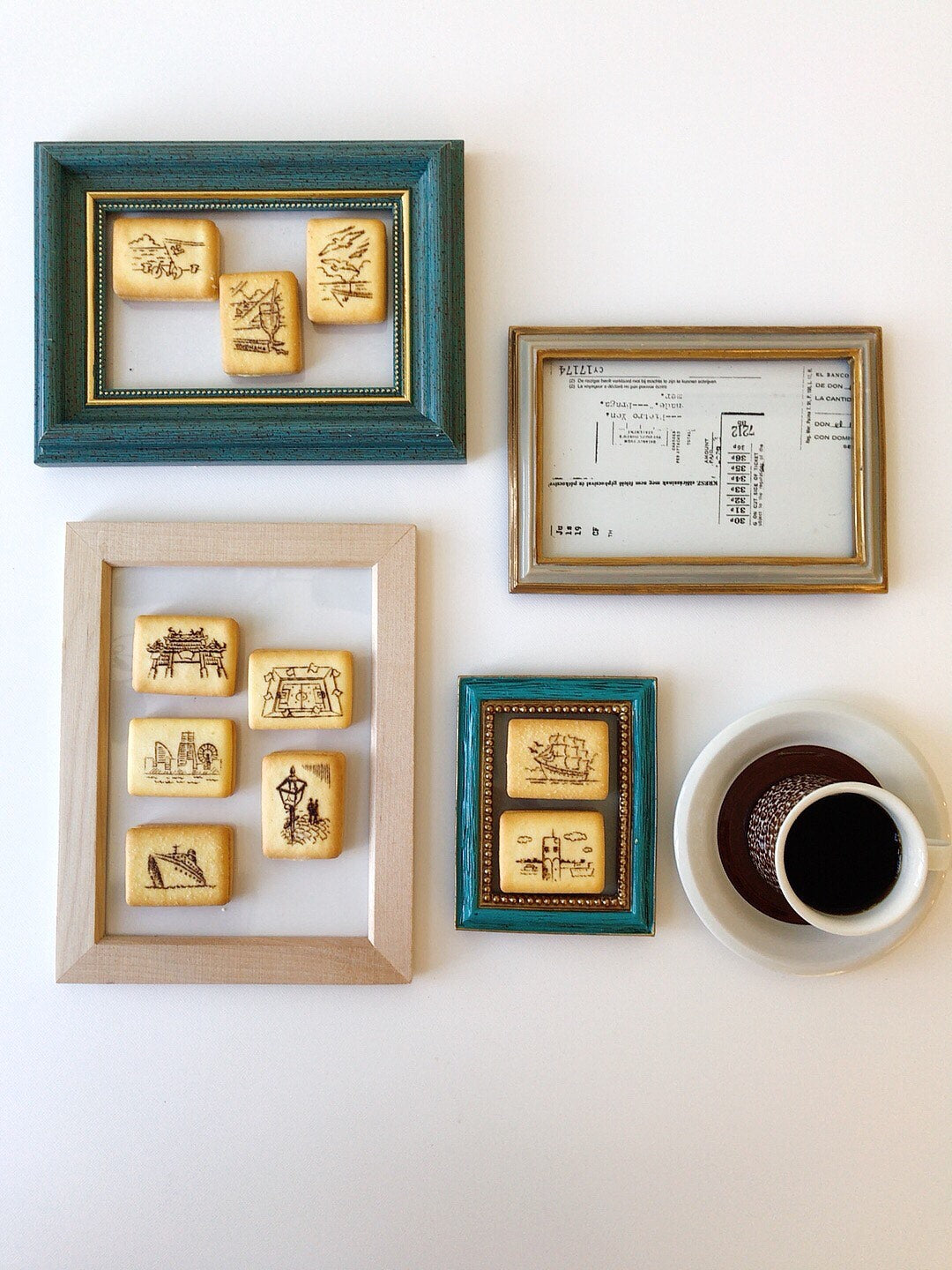 Yokohama Butter Sandwich Cookies framed with drawings, accompanied by a cup of coffee.