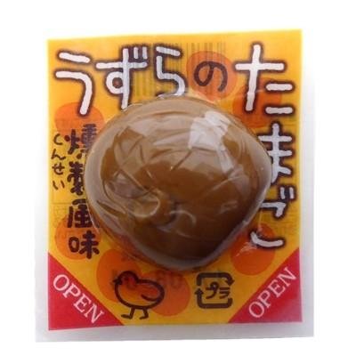 Vacuum-packed smoked flavor quail egg in box, allergen info: egg, wheat, soybean, savory snack, Japanese packaging.