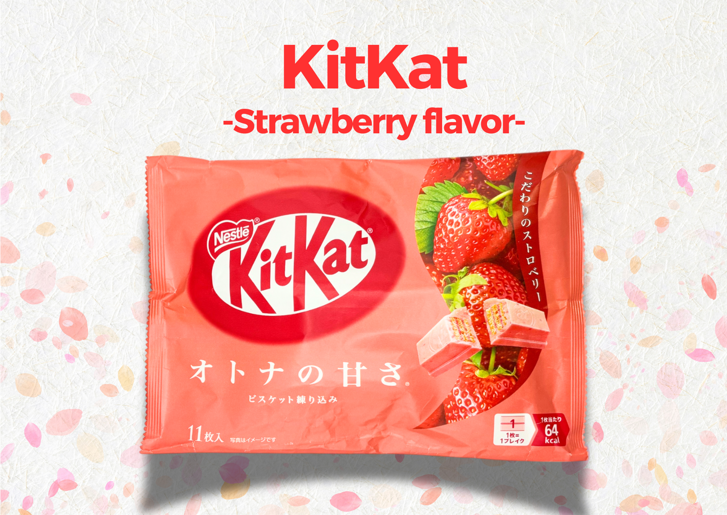 Japanese KitKat Strawberry flavor pack with fresh strawberries, featuring vibrant packaging design.