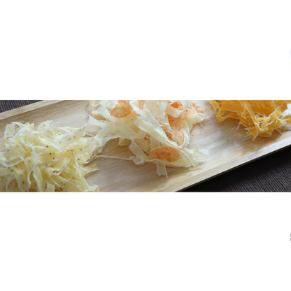 Ultra-thin Hana Cheese with codfish surimi and red cheddar on a wooden tray, ideal for salads, pasta, and pizza toppings.