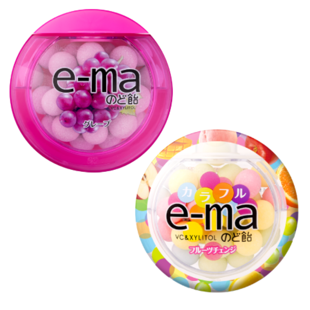 e-ma cough drops in two containers, grape flavor with green mandarin orange powder and colorful fruit, for soothing throat relief.
