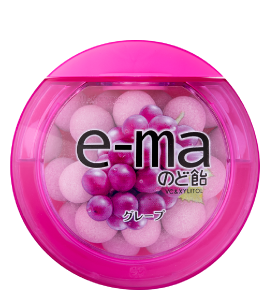 e-ma Grape Cough Drops with green mandarin orange powder for throat relief, fruit-flavored drops in pink packaging