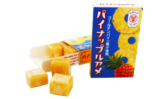 SEIKA FOODS Soft Fruit Rice Candy with pineapple flavor, featuring golden pineapple juice. Contains soybean. Box and candy pieces shown.