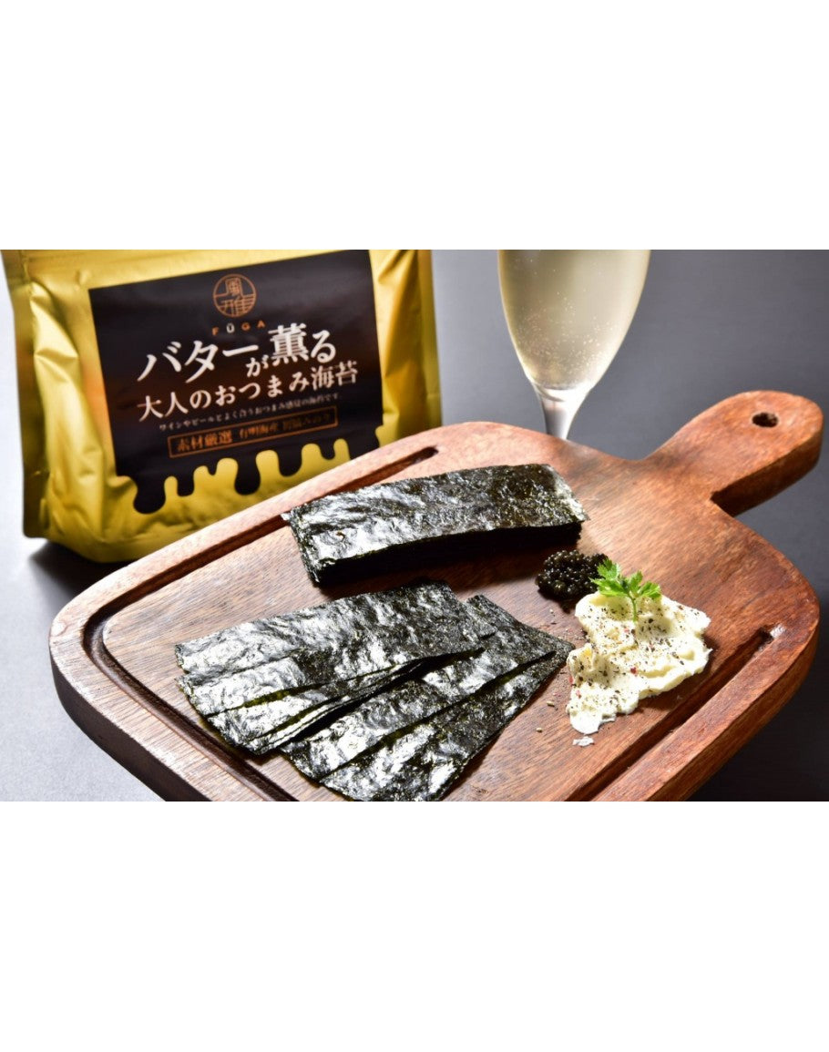FŪGA Flavourful Laver with buttery nori, paired with herbs and a glass of white wine, served on a wooden platter.