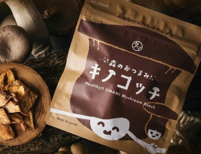 Kinokocchi Mushroom Chips packaging and dried mushrooms on a rustic table. Healthy umami snack with Japanese flavors.