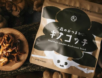 Bag of Kinokocchi Mushroom Chips with Shiitake and Eringi flavors on a wooden surface, showcasing healthy Japanese umami snack.