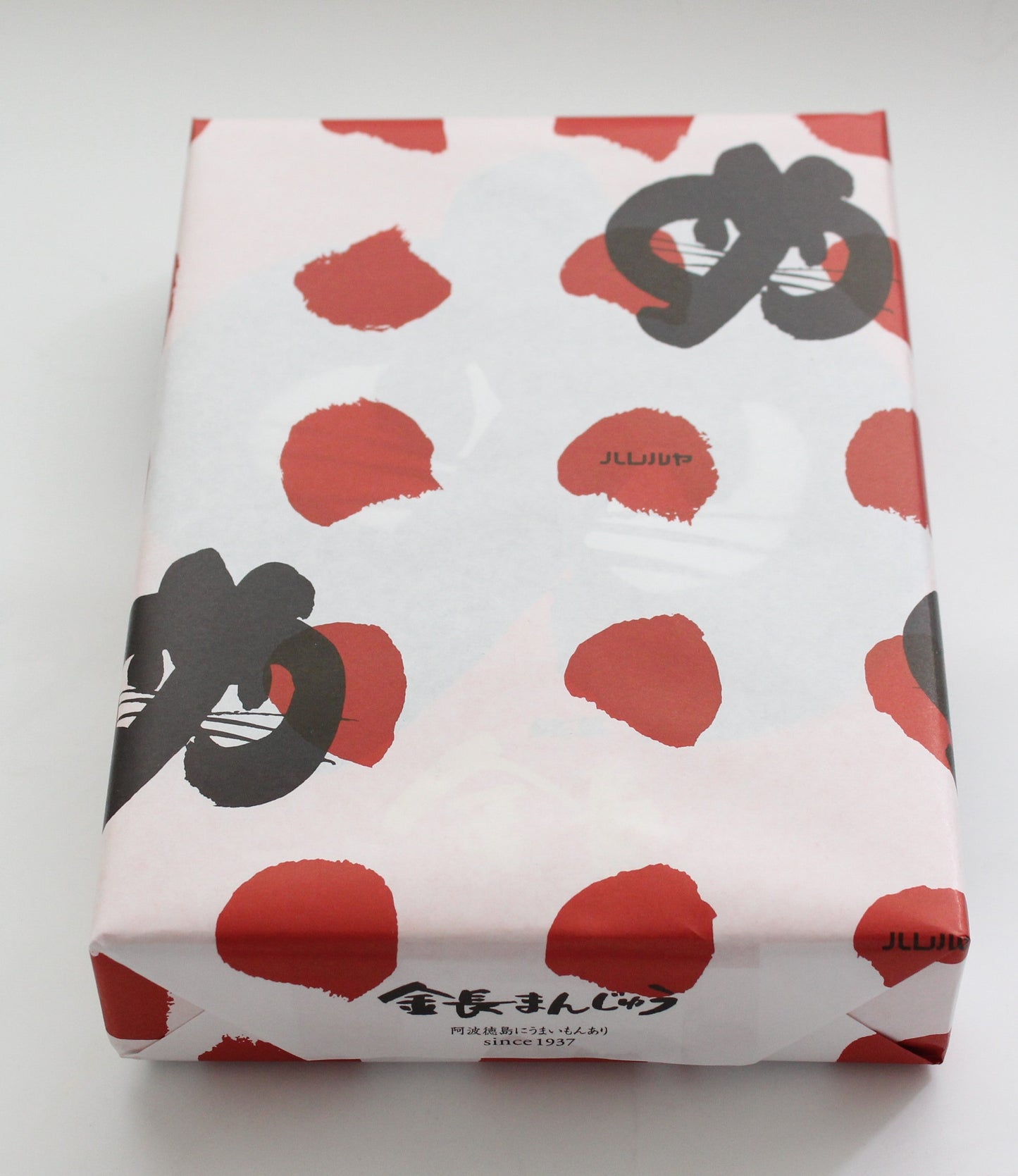 "ICHIIOKA SEIKA Chocolate and White Bean Bun in traditional Japanese packaging."