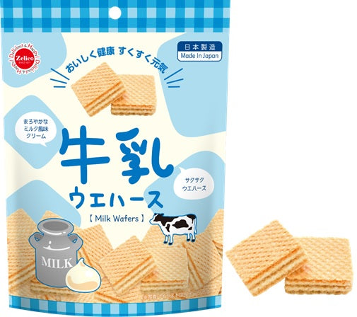 Pack of milk flavor wafers with creamy filling, featuring Japanese branding and cow illustration. Common allergens: wheat, dairy.