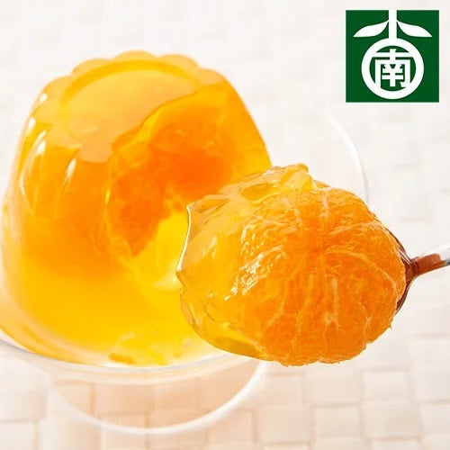 Tamura Mandarin Orange Whole Jelly with visible tangerine fruit in a glass dish, set of 3, showcasing vibrant orange color and sweetness.