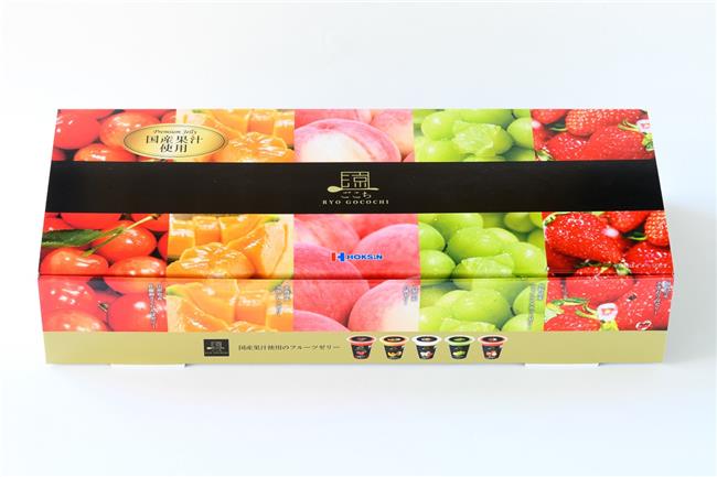 Ryo Gocochi Jelly Assortment box with vibrant images of fruits including melons, grapes, peaches, cherries, and strawberries on packaging.