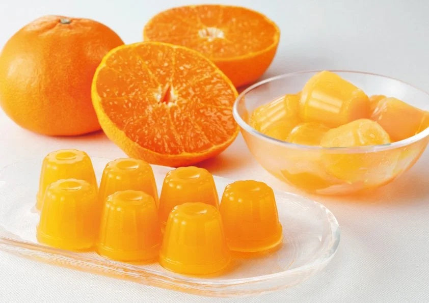 Ehime Setoka Orange Jelly Mini 10P made from sweet Setoka oranges, served chilled or frozen, with whole and sliced oranges.