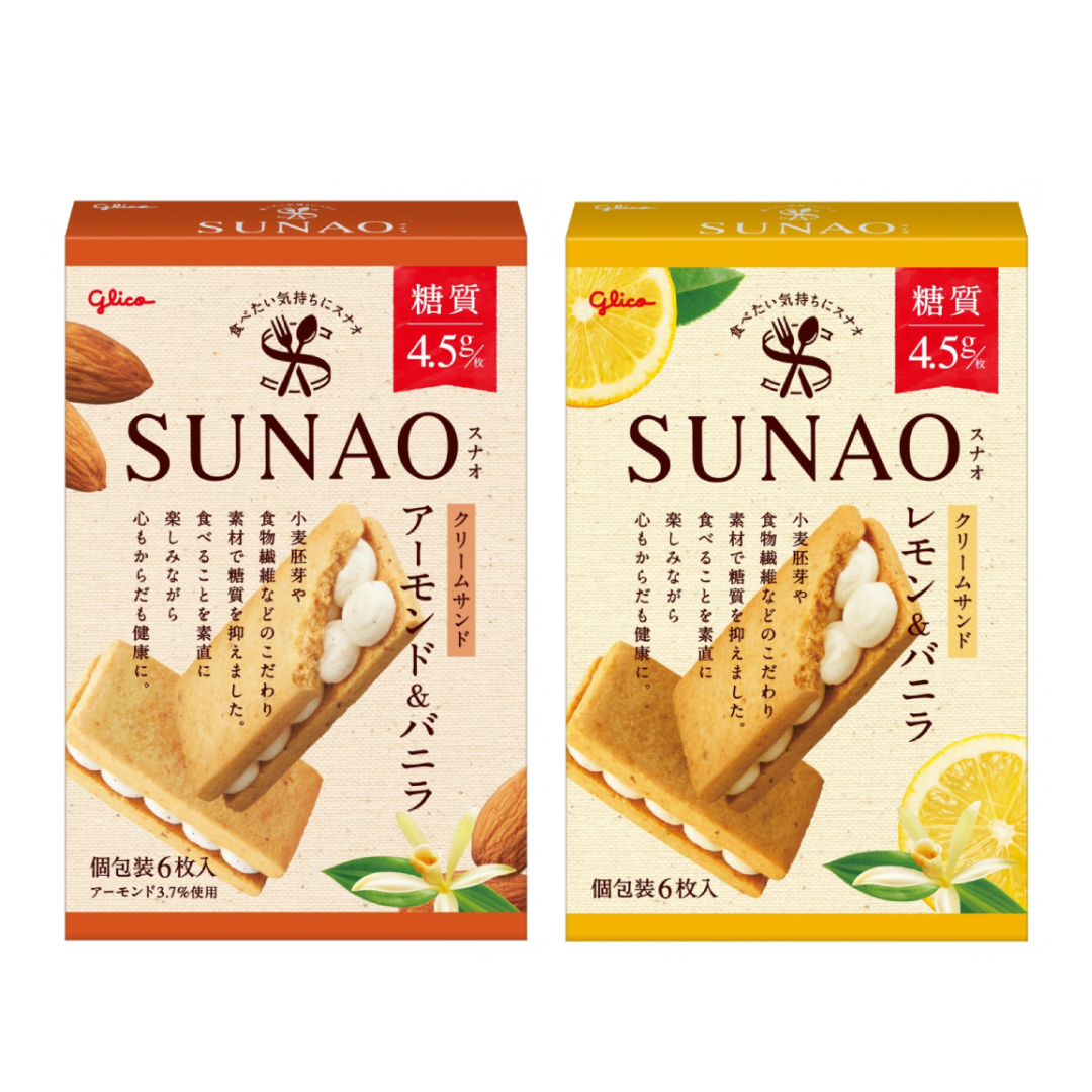 Glico SUNAO low-sugar cream sandwich cookies with almond and vanilla, and lemon and vanilla flavors, displayed in packaging.