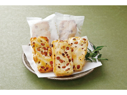 Oosodefurimamemochi rice crackers, soft and soybean-infused from Hokkaido's Tokachi region, displayed on a plate.