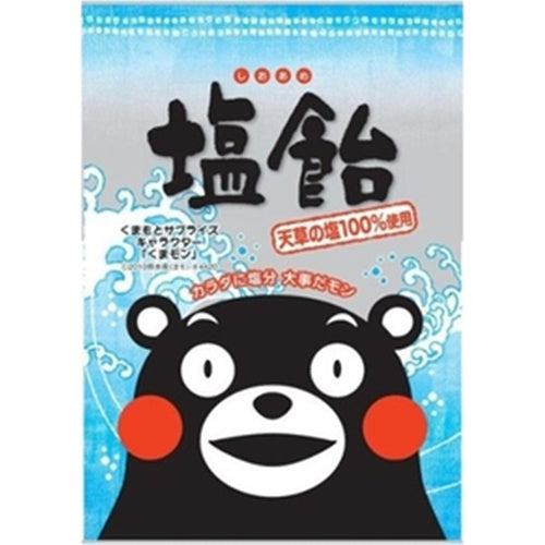 Packaging of Kumamon Salt Candy made with 100% Amakusa salt, featuring a cartoon character and Japanese text on a blue background.