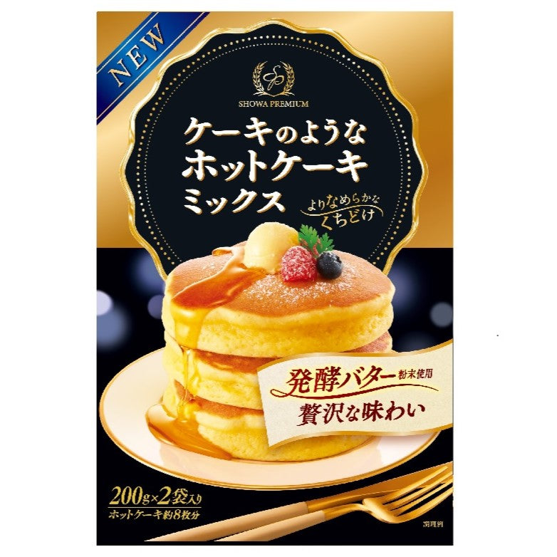 Hot Cake Mix box with stack of pancakes topped with syrup and berries, featuring luxurious taste from fermented butter and soft texture.