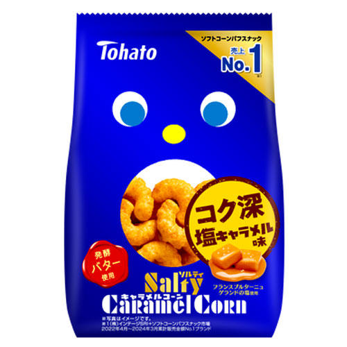 Blue package of salted caramel corn snack with penguin design and visible caramel popcorn.