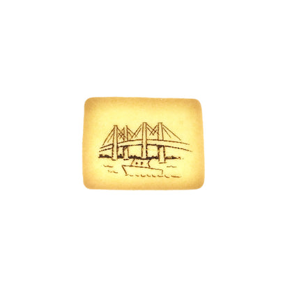 Yokohama Butter Sandwich Cookie with bridge and boat design, featuring buttery cream and sprinkled salt on a crispy biscuit.