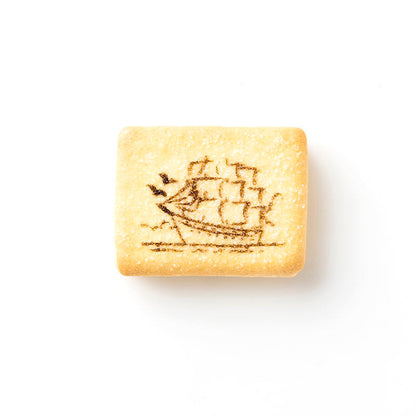 Yokohama Romance Cookie biscuit with landmark print and vanilla cream, contains wheat, egg, dairy, soybean allergens.