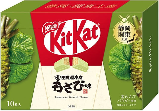 Tamaruya Wasabi Flavor Japanese KitKat in green packaging with wasabi plant illustration.