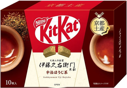 Japanese KitKat box featuring Uji Hojicha green tea flavor from Kyoto with Nestle branding and two cups of tea.
