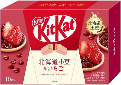 Japanese KitKat packaging featuring Hokkaido Azuki and Strawberry flavor, with Nestle logo and strawberry imagery.