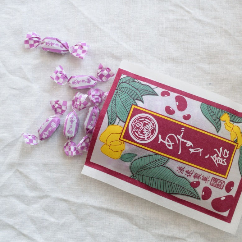 Naniwa Seika Azuki-Flavored Kelp Candy in colorful packaging and individual purple wrappers on a white background.