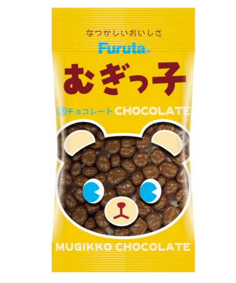 Mugikko Chocolate coated barley puff in yellow packaging with bear design, contains wheat, dairy, soybean. Caution: heat-related damage possible.