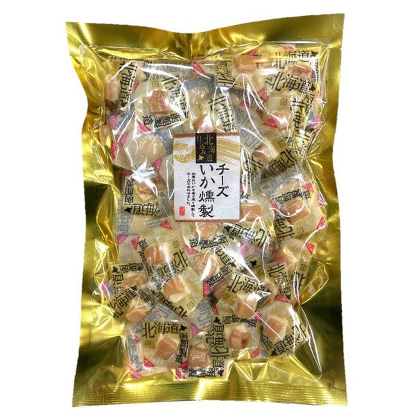 Packaged smoked squid with cheese snack, individually wrapped in a shiny gold bag. Contains dairy, squid, and gelatin.
