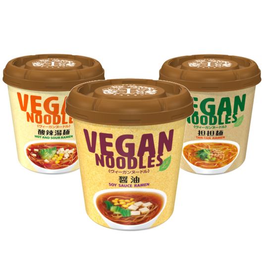 Assorted vegan noodle cups including soy sauce, hot and sour, and tan-tan flavors, free from animal ingredients and chemical seasonings.