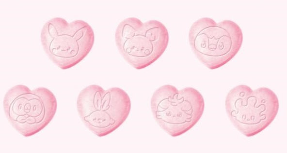 Heart-shaped Pokémon ramune candies with seven different Pokémon designs on each piece.