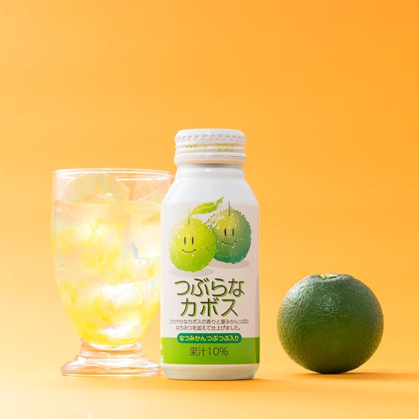 Tsuburana Drink 190g bottle can with citrus fruit and glass with ice on an orange background, emphasizing fresh flavor and texture.