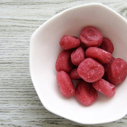 Koumemaru Soft Plum 45g made with Kishu Nanko plum and apple, displayed in a white bowl on a textured surface.
