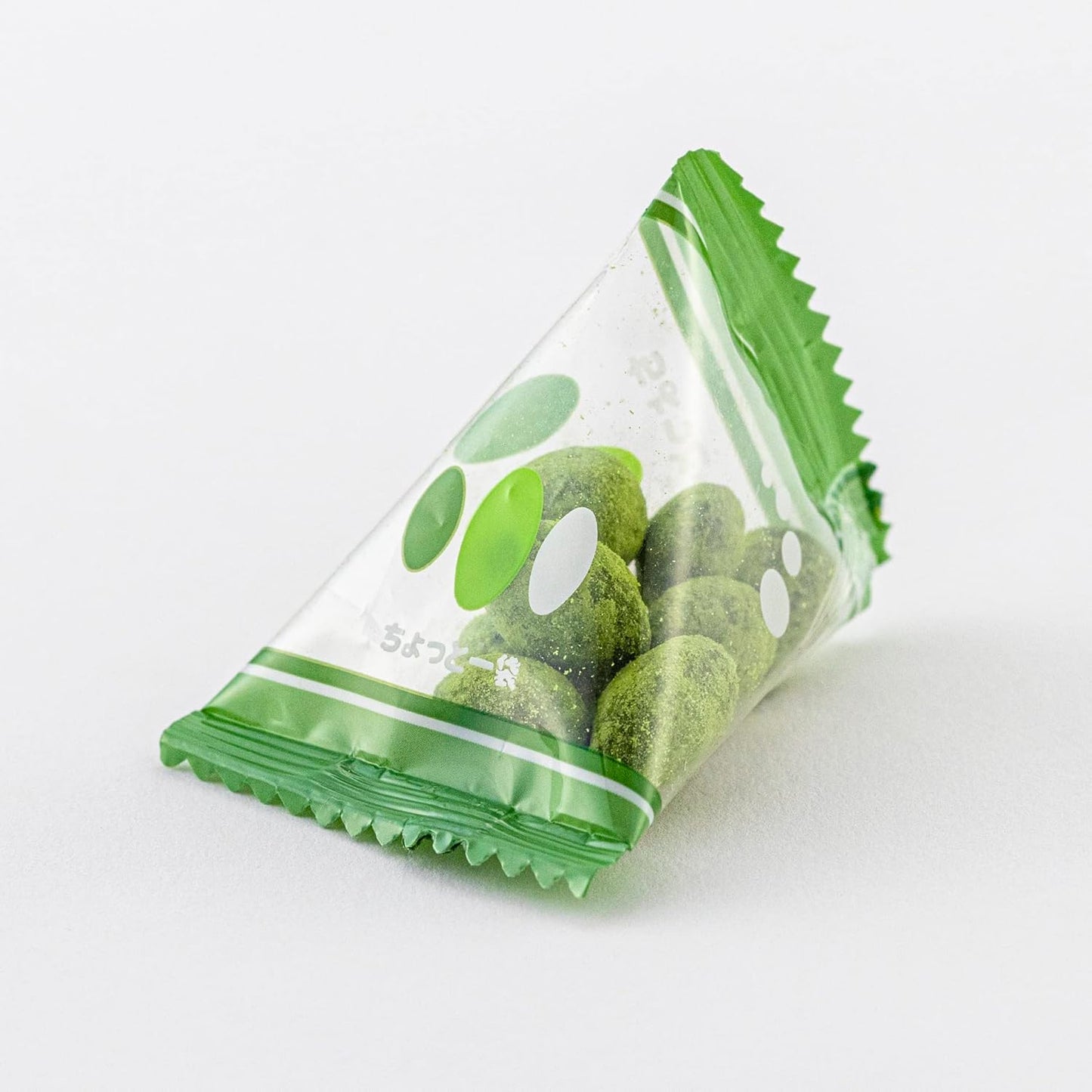 Individually wrapped Matcha Almonds 100g, featuring crunchy almonds coated in aromatic matcha. Contains dairy and almond allergens.