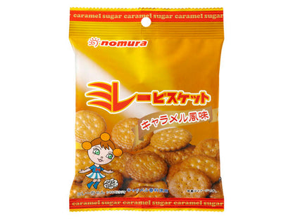 Package of Nomura caramel-flavored Millet Biscuits with savory, crispy texture and sweet-salt balance, containing wheat and soybean allergens.