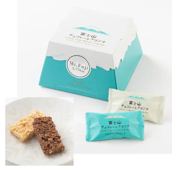 Mt. Fuji Chocolate Crunch 12P box in Mt. Fuji shape featuring strawberry, milk, and white chocolate with crunchy texture.