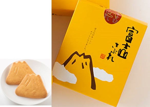 Mt.Fuji shaped sable cookies next to yellow box packaging, illustrating the buttery and crunchy snack, popular as gifts.