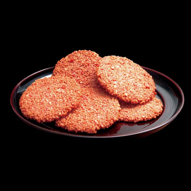 Hokkaido crab rice crackers with crispy browned texture on a black plate, Kyoto Takara Seika, savory seafood snack, 14 pieces.