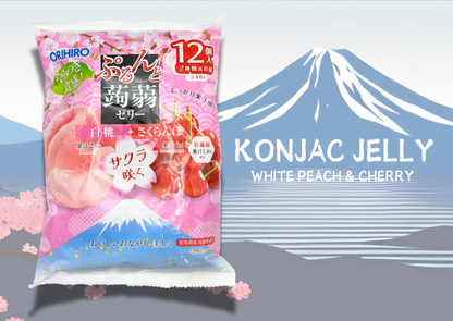 Konjac Jelly with white peach and cherry flavor displayed against Mount Fuji backdrop. Japanese sweets theme packaging.