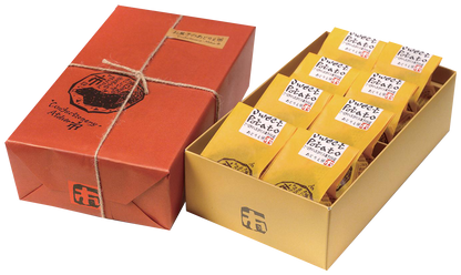 Naruto Kintoki sweet potato cake gift box from Tokushima, showcasing individually wrapped cakes for a refined sweet treat.