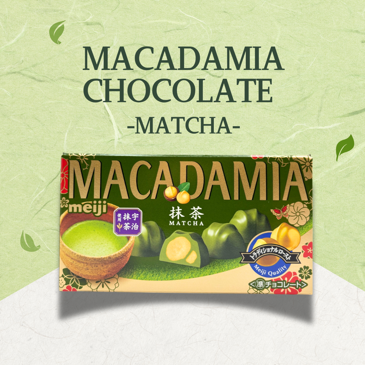 Macadamia matcha chocolate packaging with green tea leaves background, showcasing Japanese treat by Meiji.