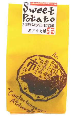 Packaging of Japanese Naruto Kintoki Sweet Potato Cake in yellow wrap, featuring a traditional design. Contains egg, dairy, and soybean.